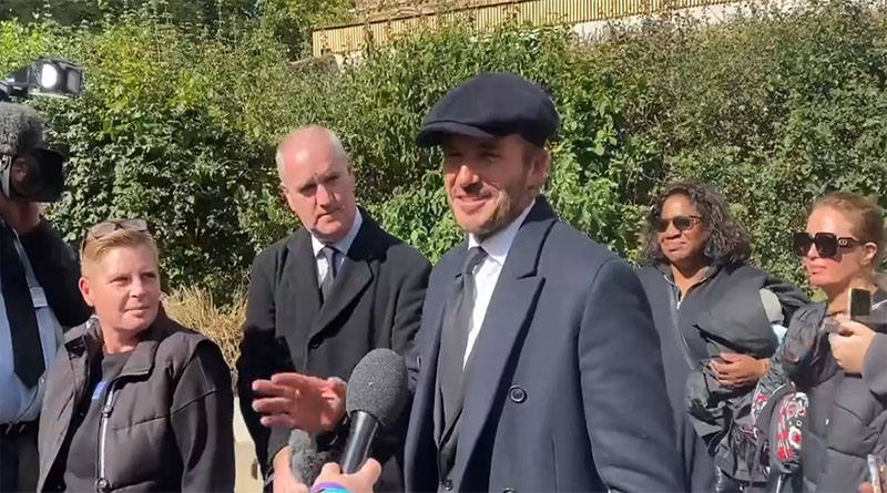 David Beckham reina Isabel II