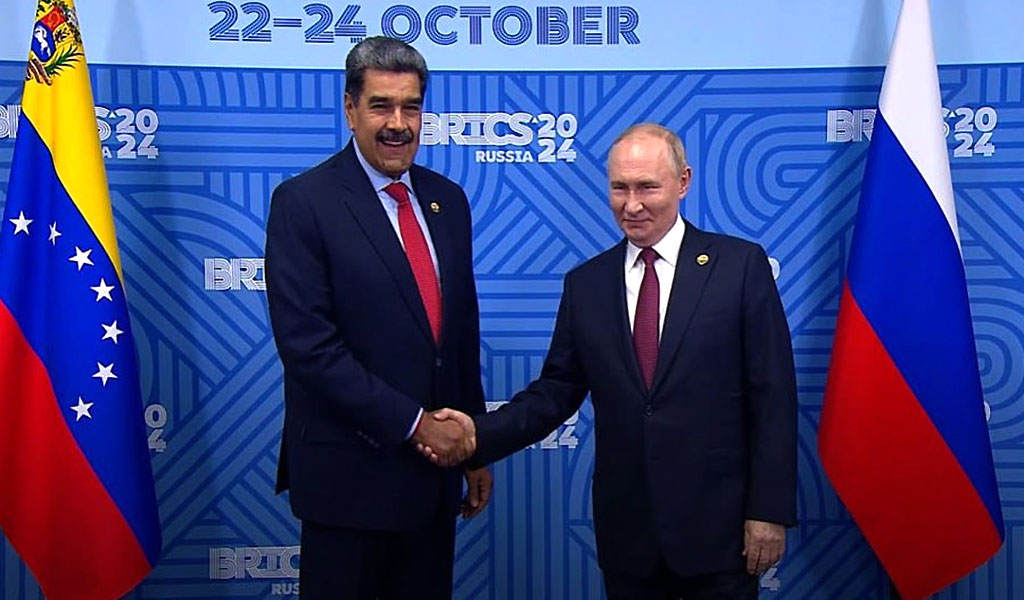Vladimir Putin a Nicolás Maduro